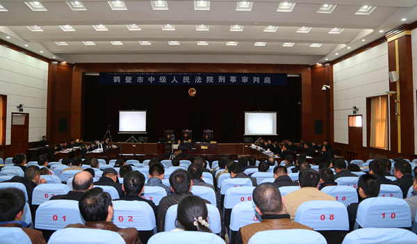 鹤壁市中级人民法院一审公开开庭审理被告人王华等人涉嫌组织领导参加